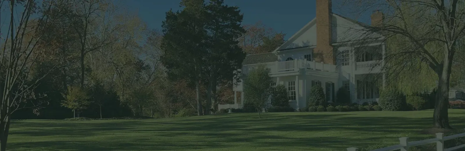 House with green healthy lawn